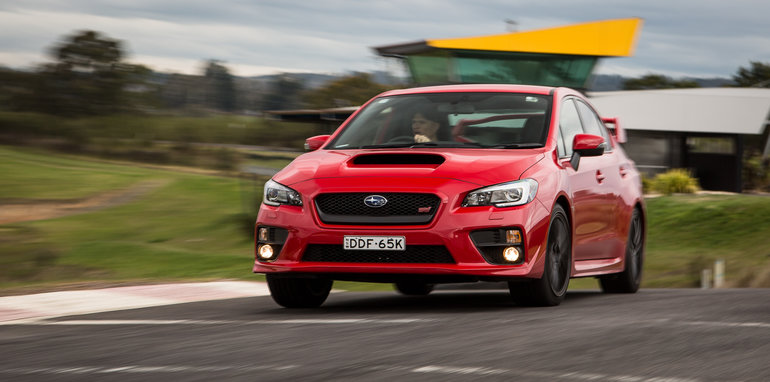 2016-ford-focus-rs-subaru-wrx-sti-volkswagen-golf-r-track-test-16