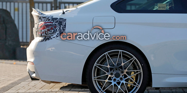 bmw-m4-facelift-spy-white-13-rear