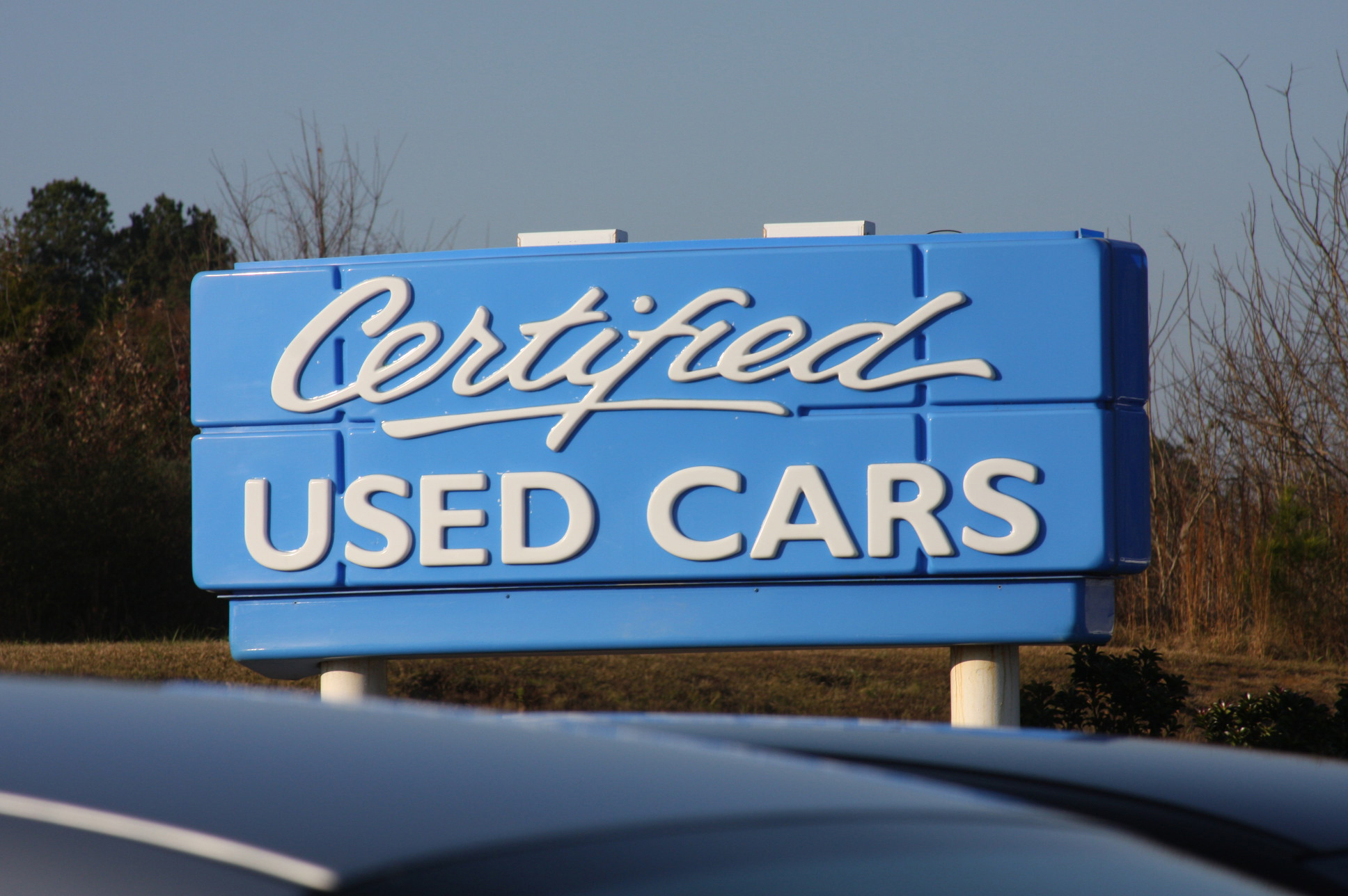 Buying a new vs used car - Photos