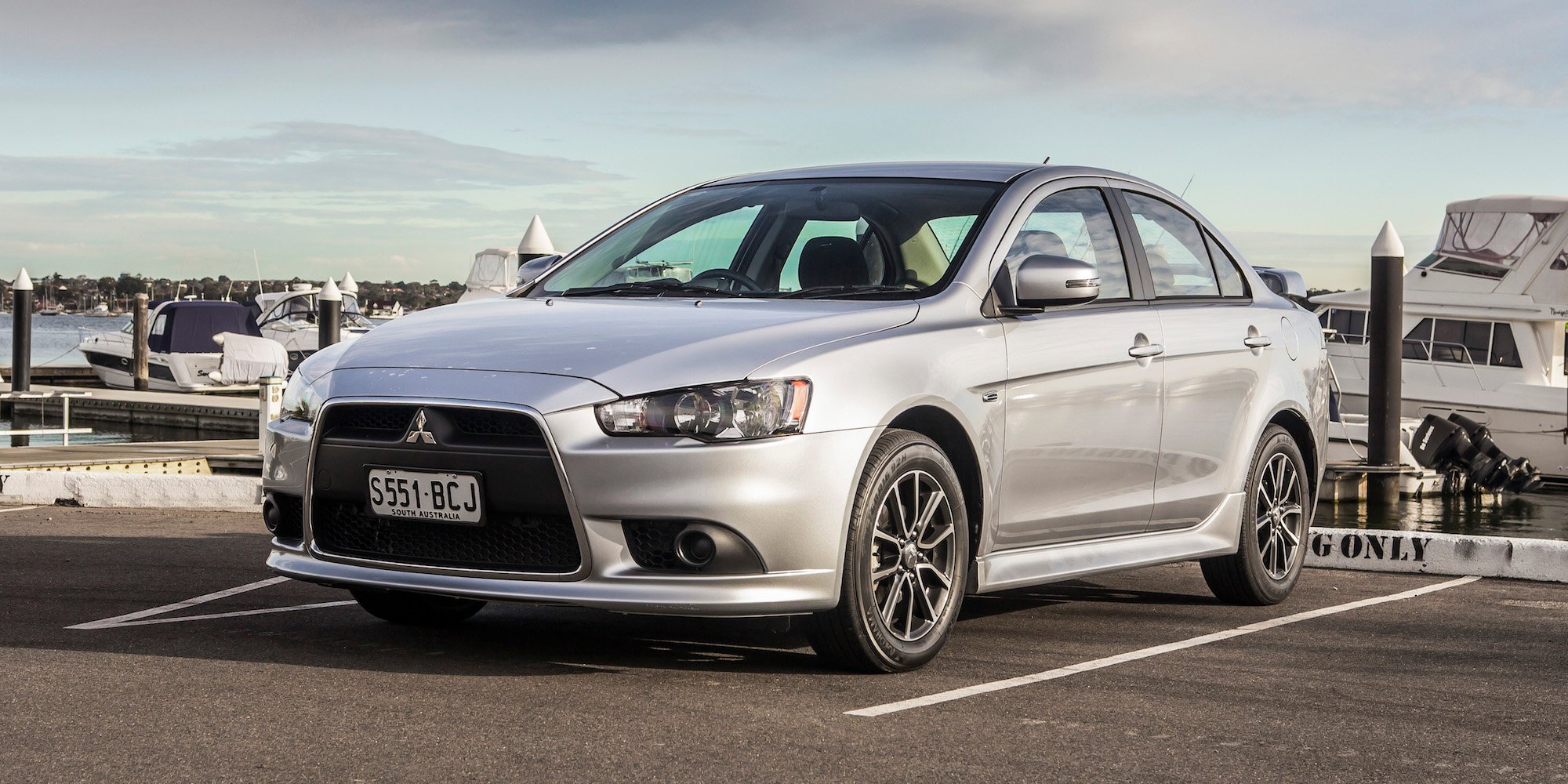 Mitsubishi Lancer 2015. Мицубиси Лансер 2015. Mitsubishi Lancer Sport 2023 года. Лансер перевод.